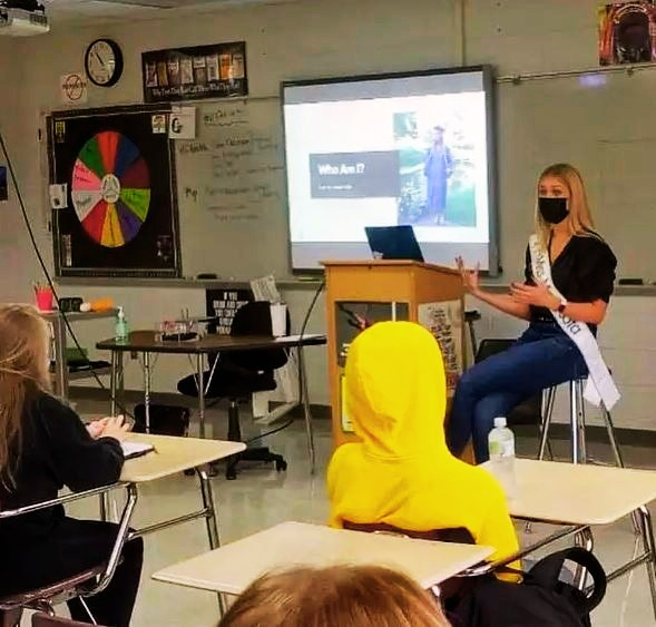 Elle Mark, Miss Minnesota and Give an Hour ambassador, visiting a school discusses children's mental health